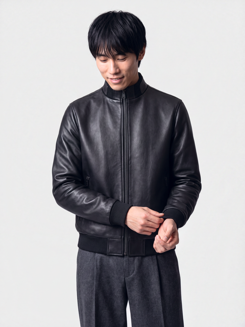 Men's smooth black lambskin leather bomber jacket, ribbed stand collar, worn closed
