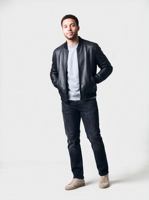 Men's smooth black lambskin leather bomber jacket, ribbed crew collar, worn open by a model